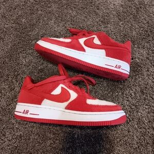 Red and White Nike Air Sneakers